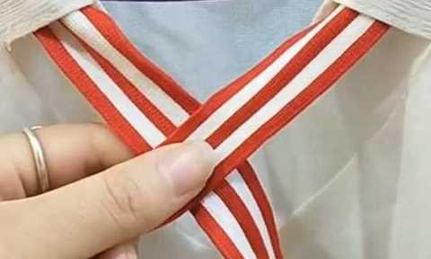 如何系蝴蝶結,蝴蝶結怎么系視頻慢動(dòng)作圖1