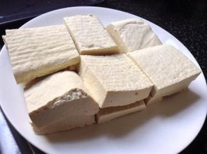 石膏豆腐點(diǎn)漿注意事項,石膏做豆腐方法,怎樣用石膏做豆腐